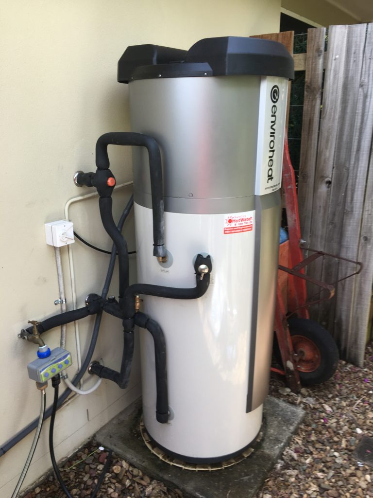 Outdoor heat pump hot water system fitted at a residence in Caboolture