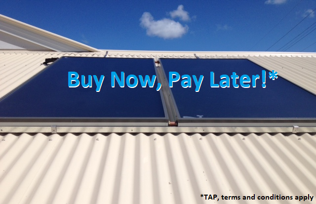 Solar hot water panels mounted on a corrugated roof in Caboolture